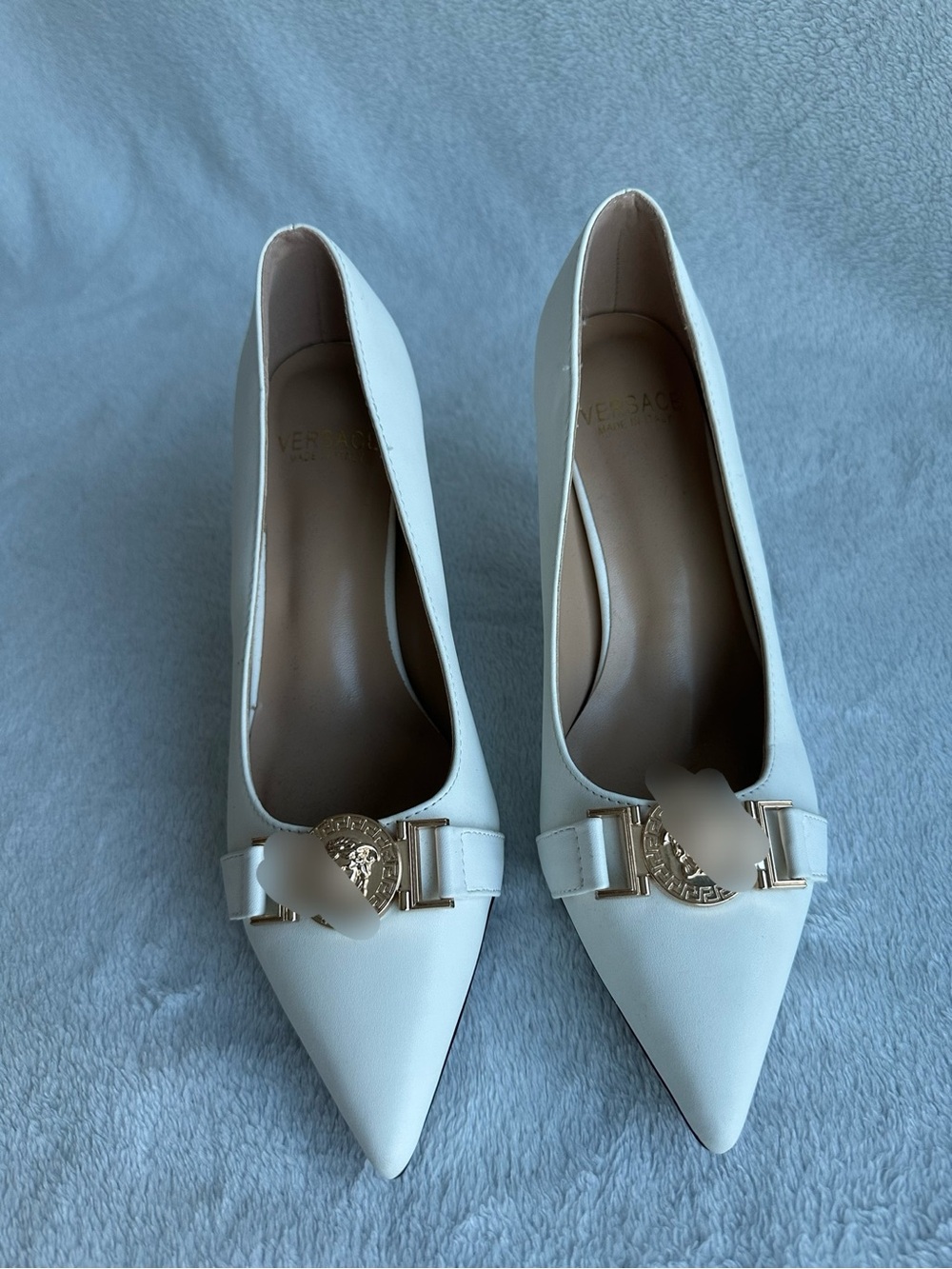 White Pointed-Toe Women's Heels with Gold Emblem
